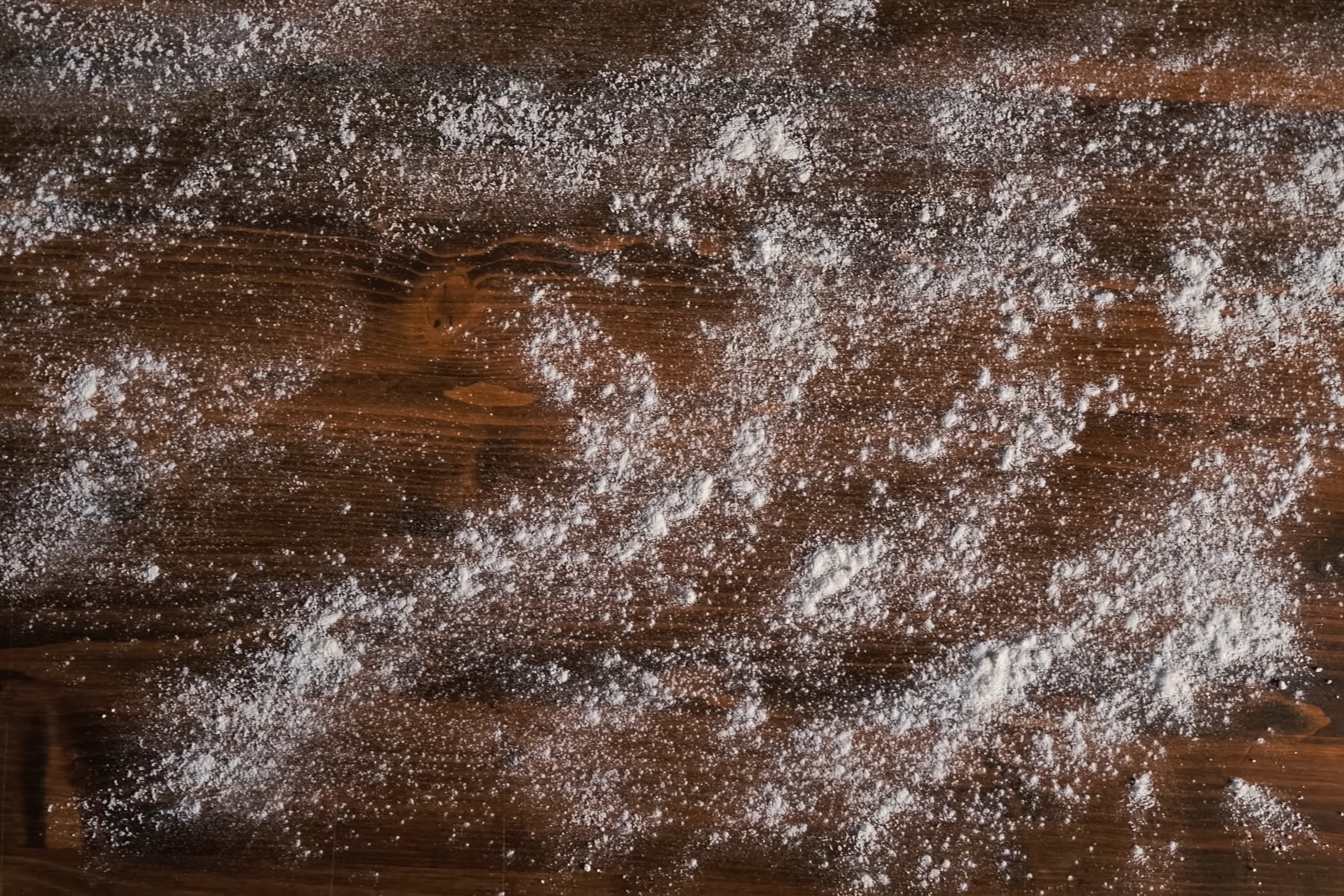 Flour on Wooden Table